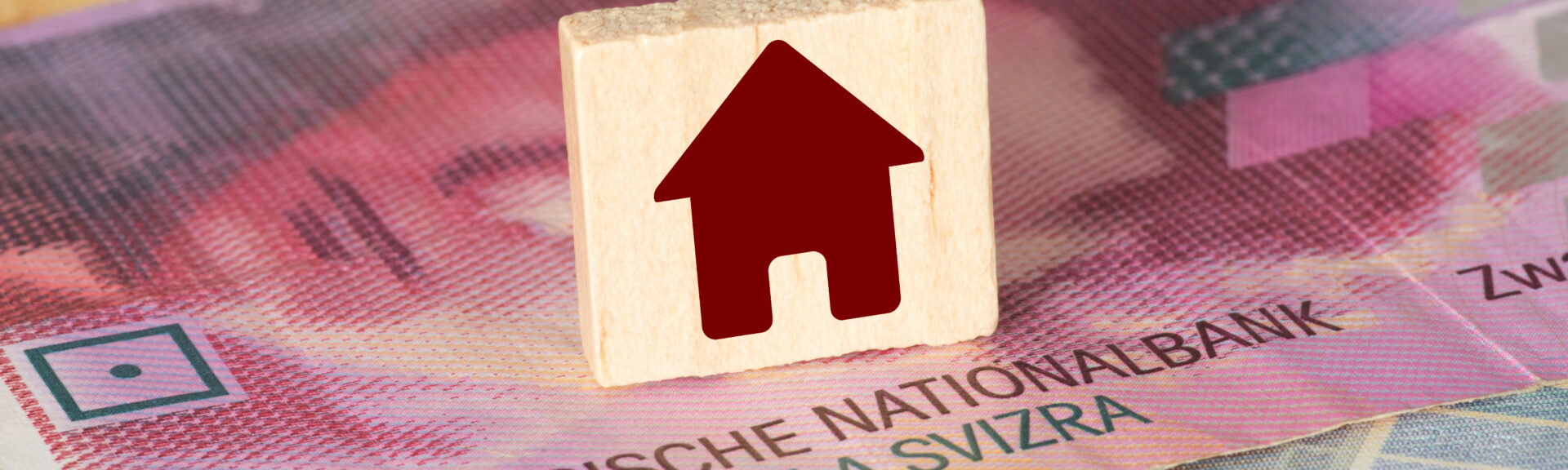 Schweizer Franken CHF und ein Haus